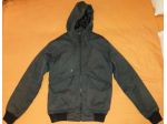 Giubbotto Volcom, modello Cavalier II Jacket, di colore grigio a tema spigato.