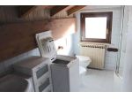 ACILIA BILOCALE ARREDATO CON BALCONE E POSTO AUTO