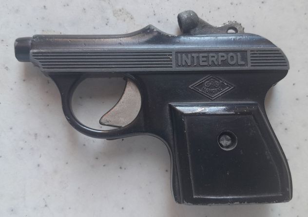 Pistola giocattolo in metallo con scritta "INTERPOL" Italia anni 70