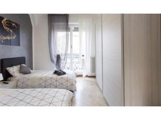 Stanza condivisa con balcone