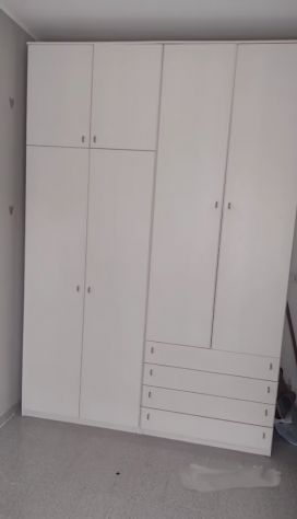Armadio 4 ante e 4 cassetti