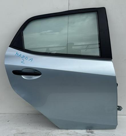 PORTA POST. S. AZZURRO CHIARO C/ALZ. E SERR. 999-U1307502 Carrozzeria  Lamierati esterni  Porte  Porta post. sx. MAZDA - 2 - 01-02-2011 - 01-03-2015,