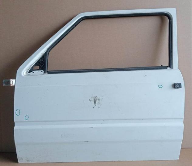 PORTA S. BIANCA C/ALZ. MAN. E SERR. (Piccoli Segni) - No cerniera inferiore 999-U1295543 Carrozzeria  Lamierati esterni  Porte  Porta ant. sx. FIAT -