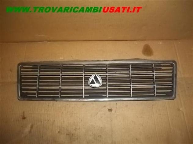 GRIGLIA CON PROFILO CROMATO AUTOBIANCHI Y10  Carrozzeria  Lamierati esterni  Paraurti  Griglia radiat AUTOBIANCHI - Y10 - 01-02-1989 - 01-08-1992, AUT