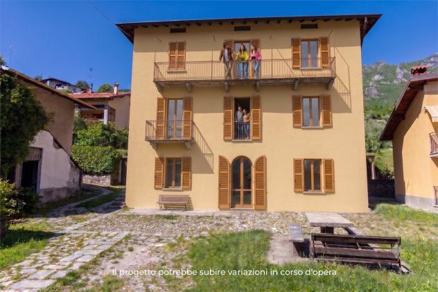 Investimento Immobiliare Mandello: Tre Unità con Giardino 163