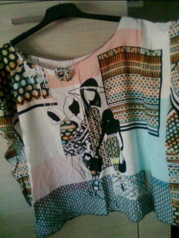 Sarta crea e vende abbigliamento tuniche su misura - Foto 4