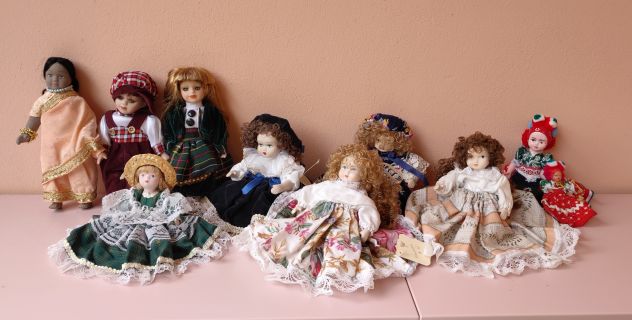 Lotto di 10 bambole vintage