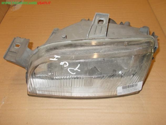 PROIETTORE S.(HELLA, -06/95) 1 PARAB. FIAT PUNTO (176-NV/NX/1B) 75 / 90 / D / TD  Parti elettriche  Fanaleria  Proiettori  Proiettore ant. FIAT - PUNT
