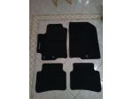 Set 4 tappetini moquette neri originali per Kia Stonic.