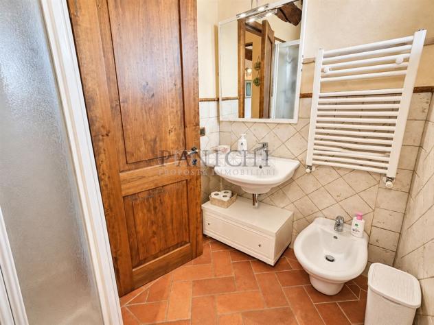 Appartamento rustico con terrazza panoramica e piscina comune - Foto 19