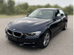 BMW 316d Sport berlina anno 2014, colore blu metallizzato