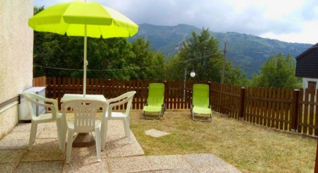 Monolocale panoramico con giardino in Abetone