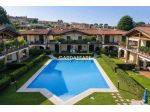 TRILOCALE AL PIANO TERRA IN SIGNORILE RESIDENCE A MANERBA DEL GARDA