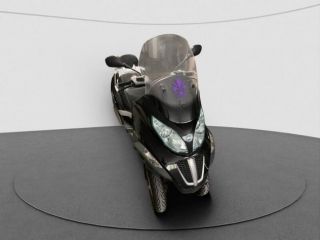 Piaggio              MP3 300 .
