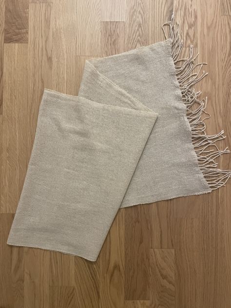 Sciarpa beige con frange