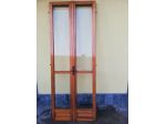 1 PORTA PER MURO PERIMETRALE EDIFICIO A DUE ANTE IN LEGNO LARICE CHIARO