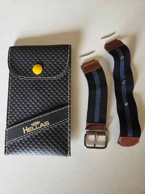 Cinghietta per orologio da uomo in tessuto elastico con porta orologio.