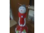 Bambole con bottiglie di vetro