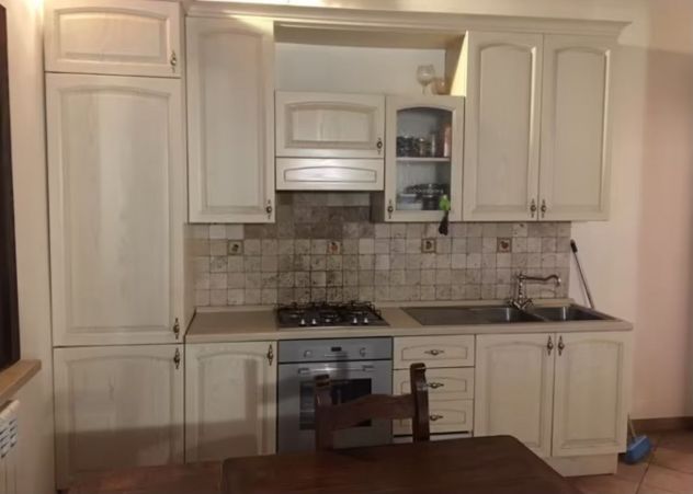EUR MAGLIANA-BILOCALE CON GIARDINO PRIVATO.