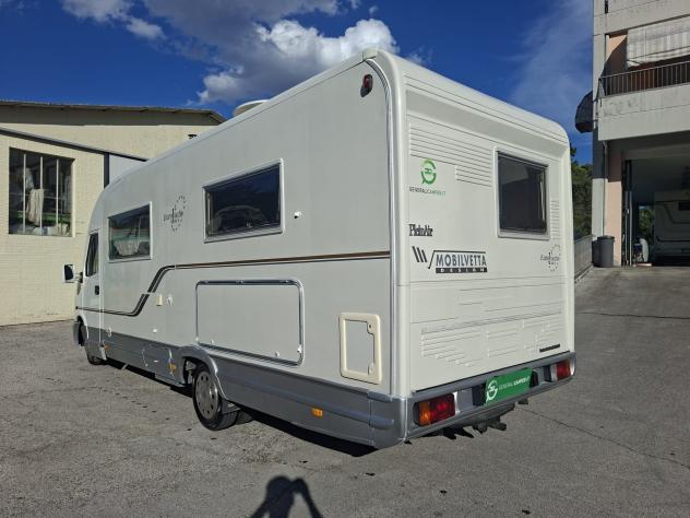 MOTORHOME MOBILVETTA IVECO DINETTE LETTO FRANCESE BASCULANTE GANCIO TRAINO CLIMATIZZATORE GEMELLATO POSTERIORE FOTOVOLTAICO CAMPEGGIO CAMPER USATI G - Foto 3