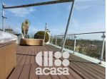 ATTICO CON AMPI TERRAZZI e POSTO AUTO COPERTO