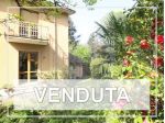 Villa a schiera anni '60 con giardino a Barzanò