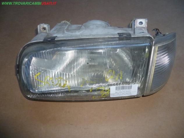 PROIETTORE S. CON FRECCIA LAT.BIANCA SKODA FELICIA (6U)  Parti elettriche  Fanaleria  Proiettori  Proiettore ant. SKODA - FELICIA - 01-02-1995 - 01-02