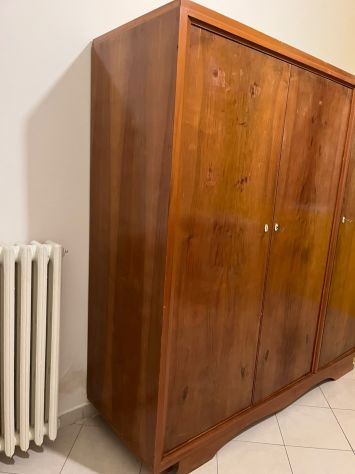 Amadio in legno e letto matrimoniale