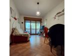 Bilocale con terrazzo e box, uso investimento