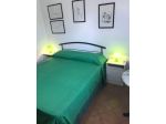 Camera con bagno ed angolo cottura