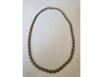 Collana girocollo in una lega di metallo anallergico. Anni '50.