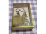 Carpisa, Nuovo Set con 2 Portachiavi, colore Mustard/Senape