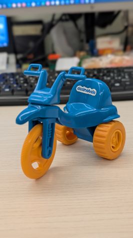 Triciclo Cicciobello azzurro e arancione