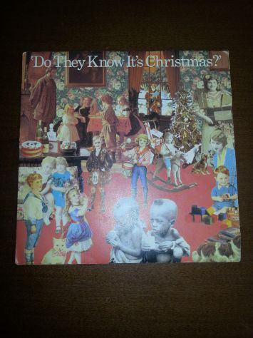UNA COPERTINA PARI A NUOVA,ORIGINALE,45 GIRI:BAND AID"DO THEY KNOW IT'S CHRISTMA
