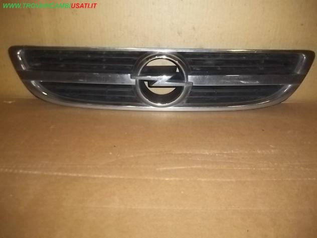 GRIGLIA CON STEMMA ANT. CROMATA OPEL ZAFIRA (T98)  Carrozzeria  Lamierati esterni  Paraurti  Griglia radiat OPEL - ZAFIRA A - 01-04-1999 - 01-07-2005