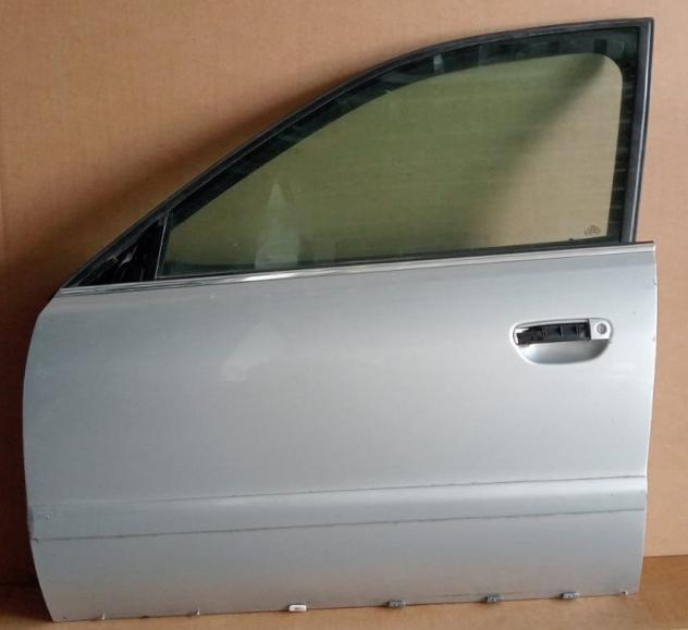 PORTA ANT.S. ARGENTO C/ALZ. E SERR. RESTYLING 99 - 2001 - EX U17388 999-U1293960 Carrozzeria  Lamierati esterni  Porte  Porta ant. sx. AUDI - A4 - 01-