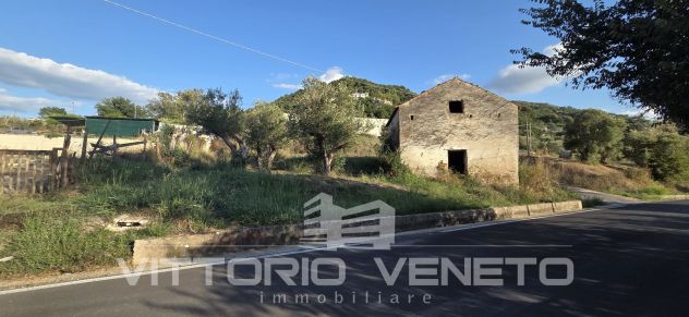 Terreno con Progetto per la Realizzazione di un Fabbricato Commerciale