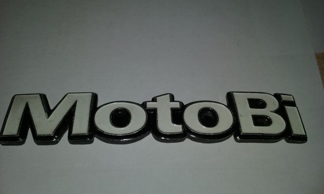 Marchio targhetta dx destra Motobì 125 2C 1974 a.e. GB 39917351