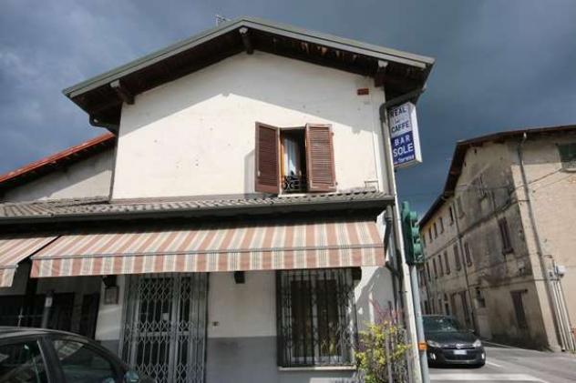 91 - Porzione di stabile con bar e appartamento