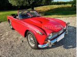 Triumph TR4 TR4A IRS Rosso Interni Pelle Nera 1966 Guida a Destra