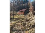 Tre baite con 22.000mq di terreno e bosco