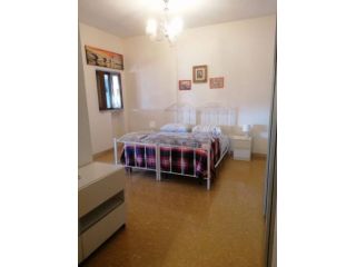 EUR MAGLIANA TRILOCALE ARREDATO CON BALCONE