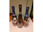 3 Bottiglie Astoria 2000 piene da collezione – 2 natalizie + 1 celebrativa