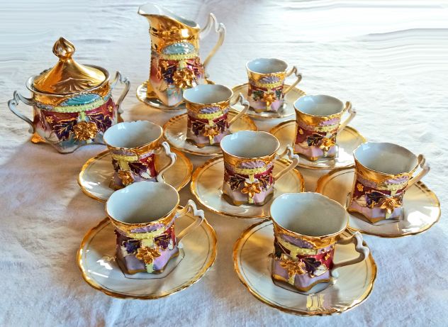 1920 ca.-Servizio Caffè per 8 in porcellana con rilievi+oro zecchino e lustri