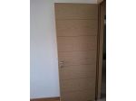 Porte interne in legno con greca decorativa