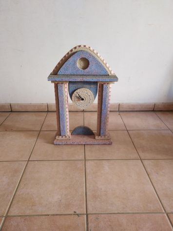 orologio in pietra leccese