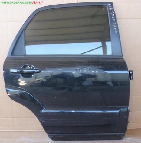 PORTA POST.D. NERO MET. C/ALZ. E SERR (1 Grf Cnt)  Carrozzeria  Lamierati esterni  Porte  Porta post. dx. KIA - SPORTAGE - 01-02-2004 - 01-08-2010