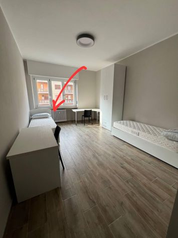 Offriamo un posto letto in una camera doppia - Foto 5