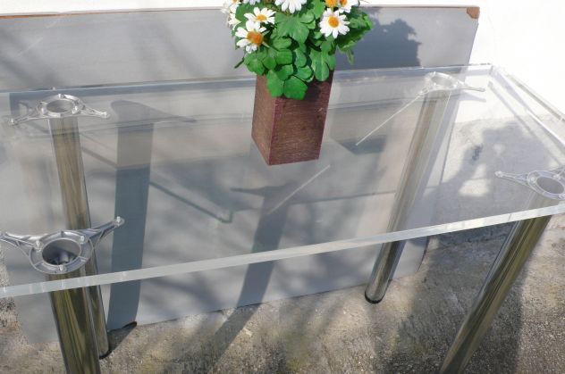 Tavoli plexiglass con gambe cromate design expo