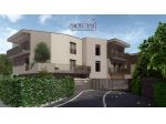 Appartamento con ampio giardino, garage e posto auto
